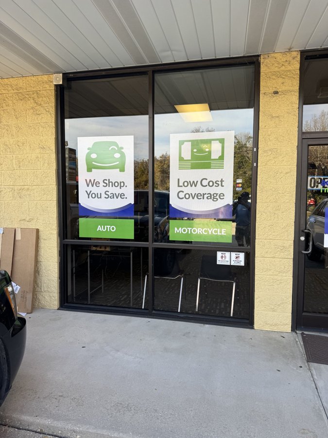 Acceptance Insurance storefront window graphics from a second angle