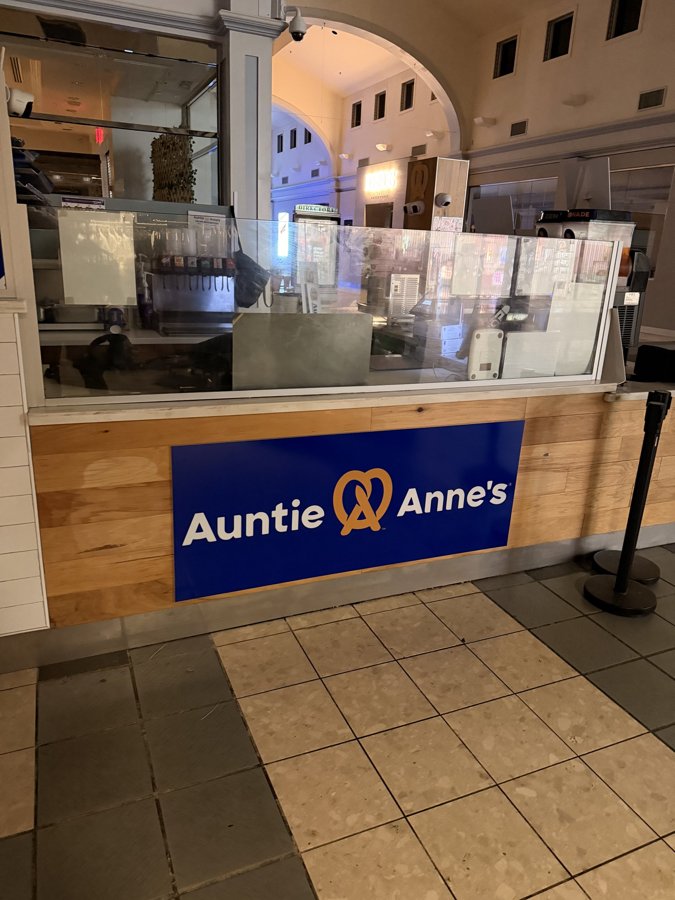 Auntie Anne's full interior with counter, wall graphics, and menu