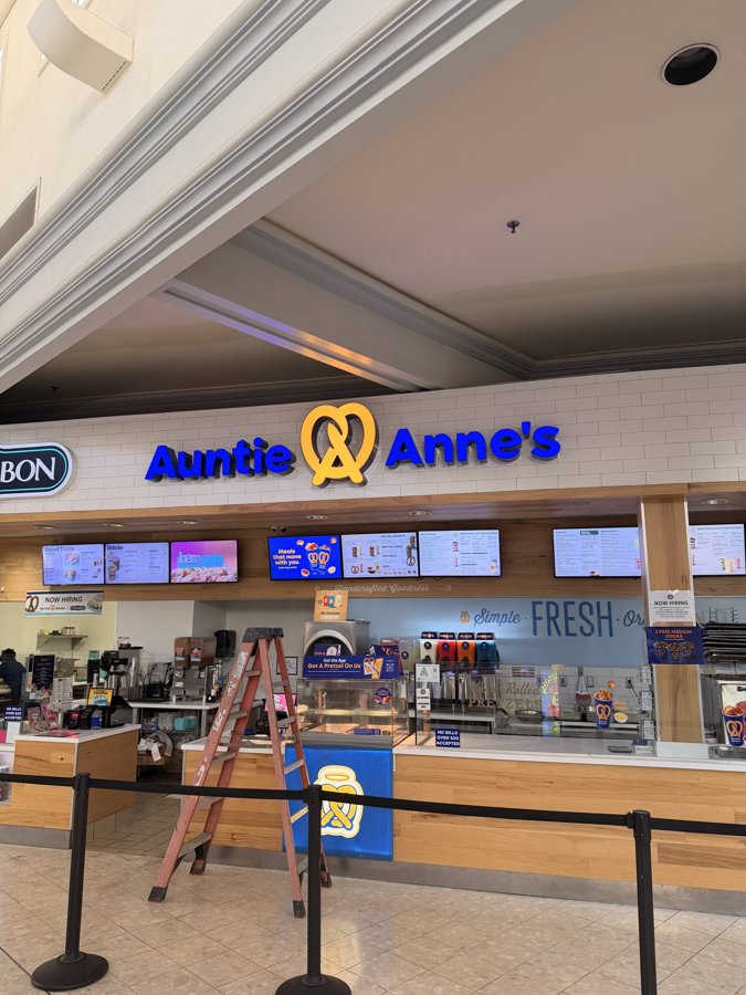 Wide view of Auntie Anne's food court storefront