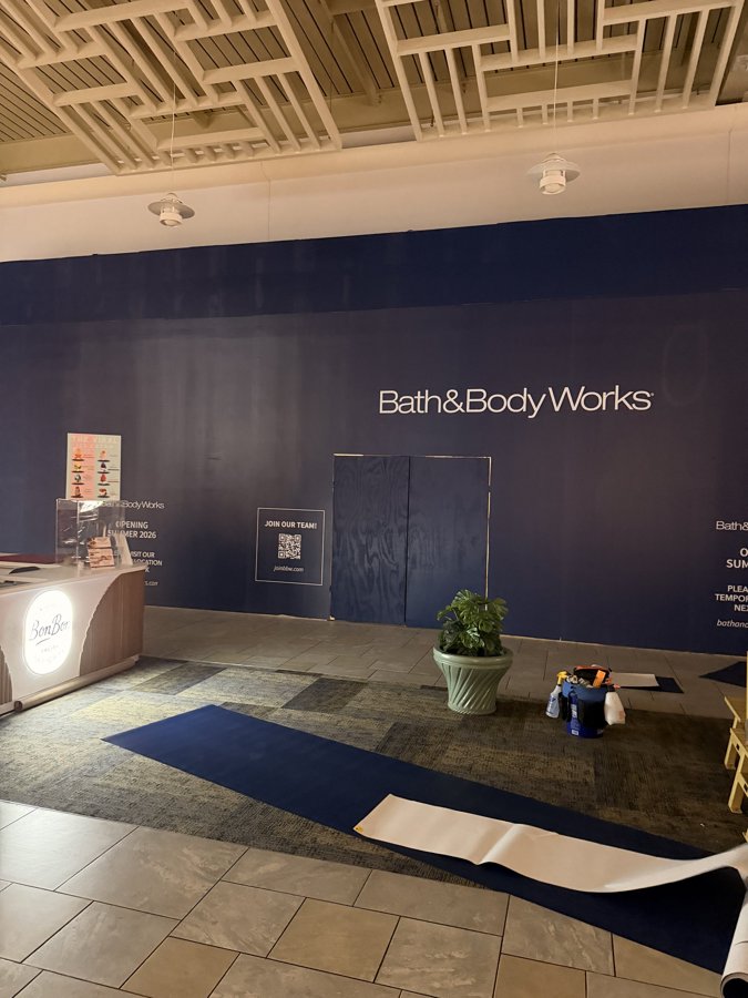 Bath & Body Works dark hoarding wall inside mall