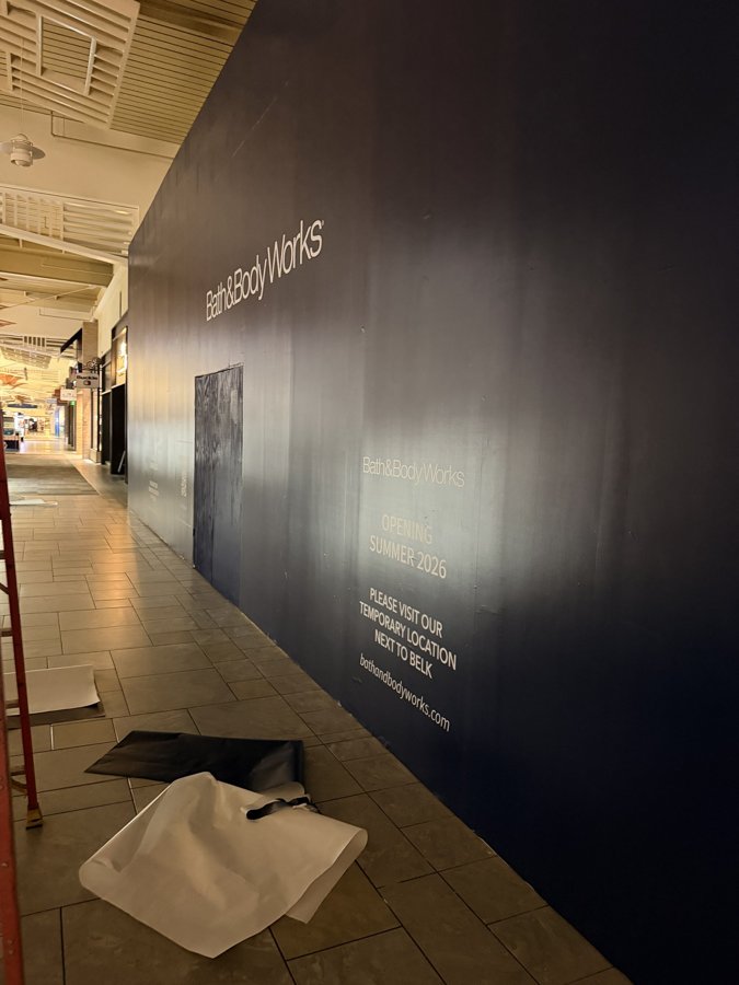 Bath & Body Works dark hoarding wide corridor view