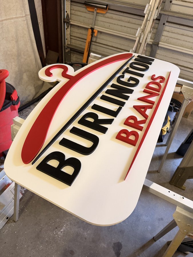 Burlington Brands oval sign fabricated in-shop, ready for finishing