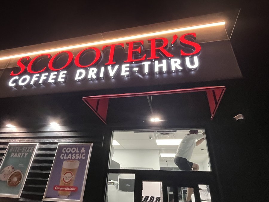 Scooter's Coffee Drive-Thru illuminated night storefront