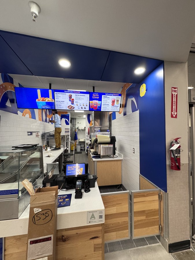 Slushie bar interior with dispensers and custom counter