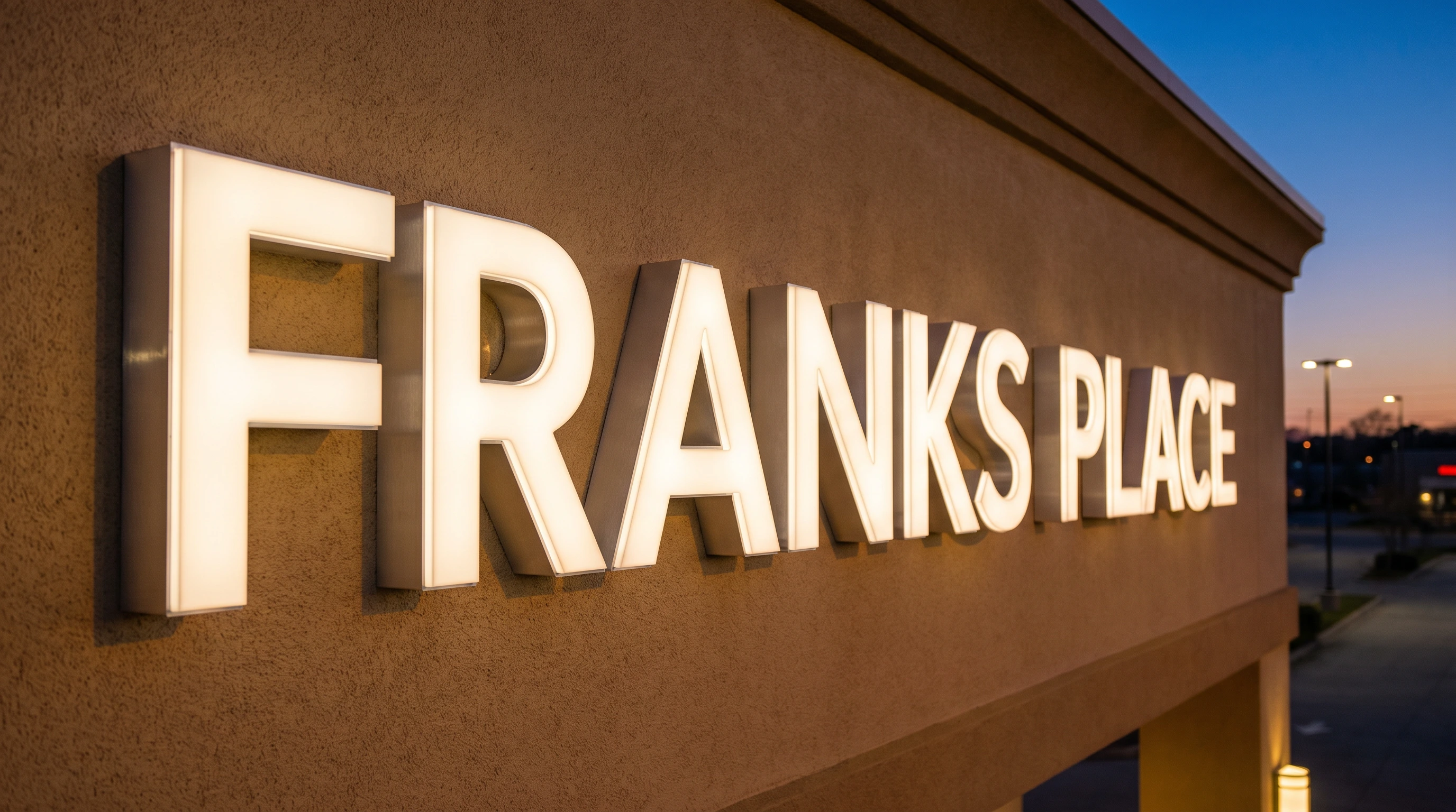 Trimless channel letters with seamless acrylic face and precision-bent aluminum returns on a modern facade.